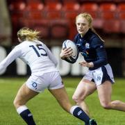 Megan Gaffney in action for Scotland against England at Broadwood in 2016 in front of a crowd of hundreds