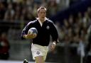 Scotland's Alan Tait runs in a try against France in the 1999 Five Nations